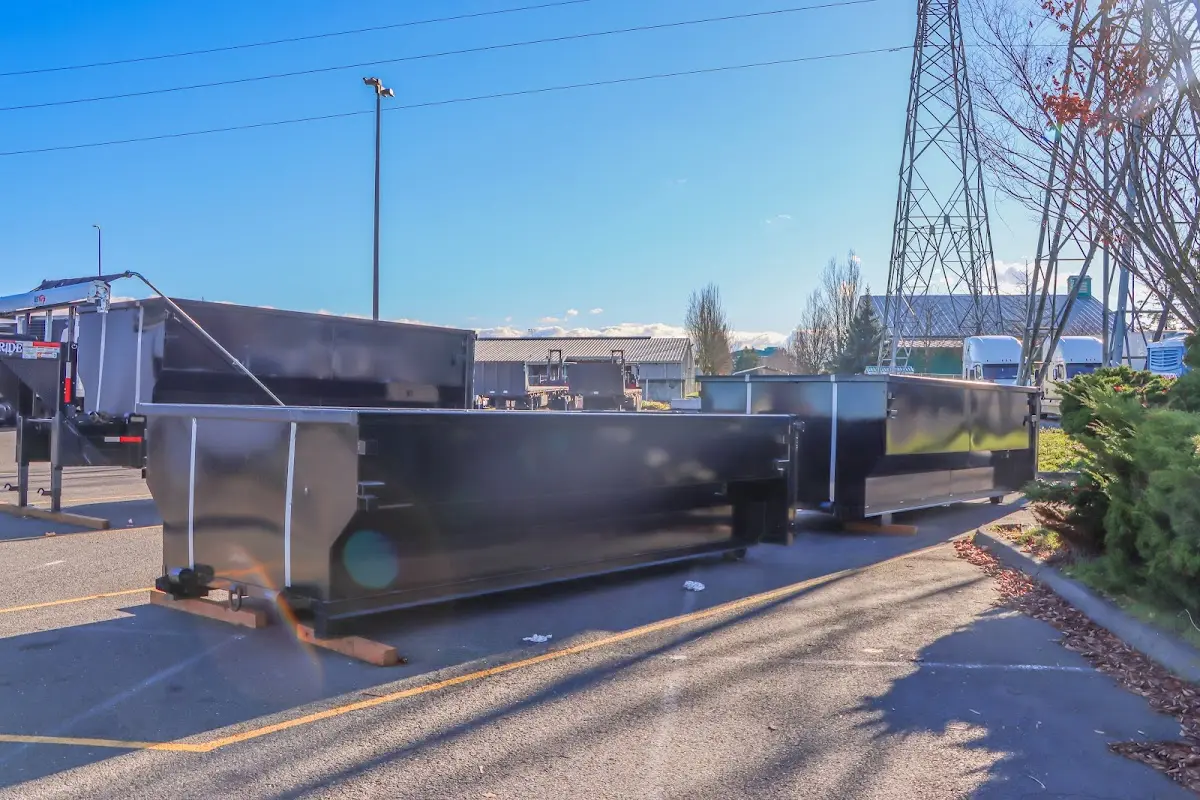 Roll-off dumpster ready for waste disposal at job site for 2 Yard Dumpster Rental in Posen